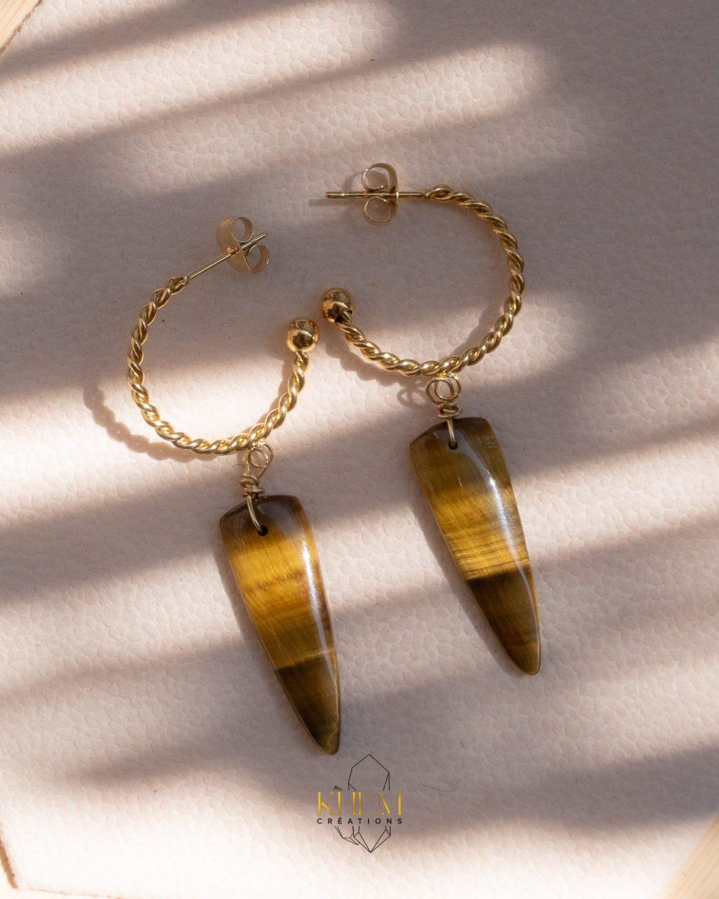 Boucles d’oreilles créoles torsadées en Œil de Tigre et acier inoxydable